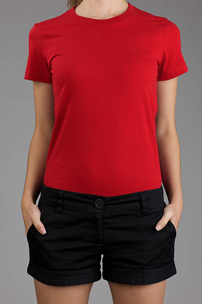 istock Young woman's torso with blank red shirt 182681434