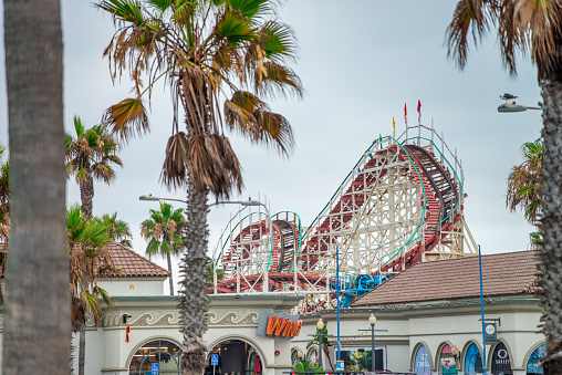 San Diego, CA, USA - Mar 24, 2022: Belmont Park, a beachfront amusement park featuring historic Giant Dipper roller coaster and Plunge pool, in the Mission Bay neighborhood in San Diego, California.