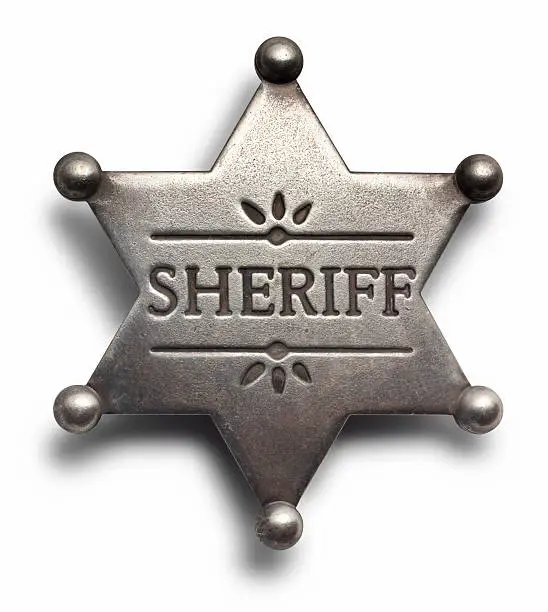 Sheriff badge on white surface with shadowFor more legal images click here: