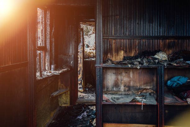 istock Burnt old rural house interior. Consequences of fire 1826826602