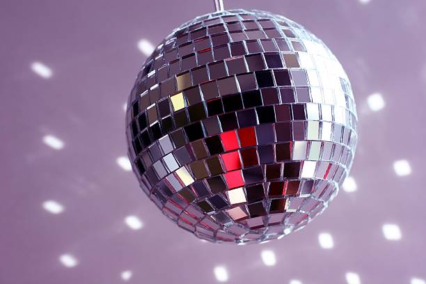 Disco Ball A disco ball sparkles and reflects sunlight on the surroundings. partytime stock pictures, royalty-free photos & images