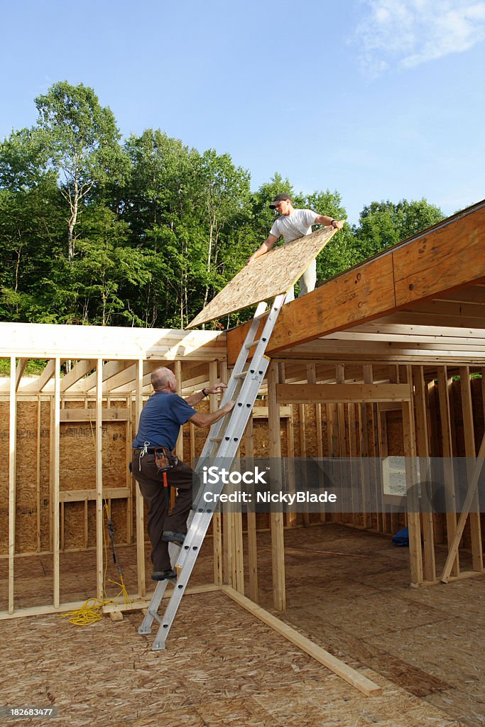 Construção de uma casa - Foto de stock de Assistência royalty-free