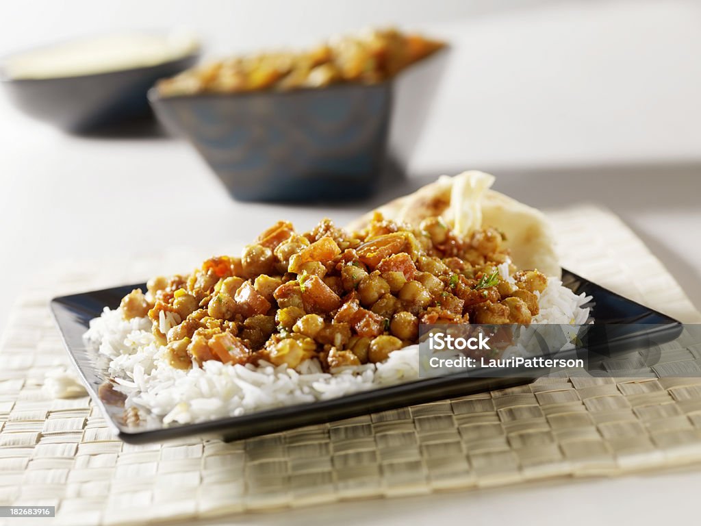 Chana Masala, indyjskie dania wegetariańskie - Zbiór zdjęć royalty-free (Ciecierzyca)