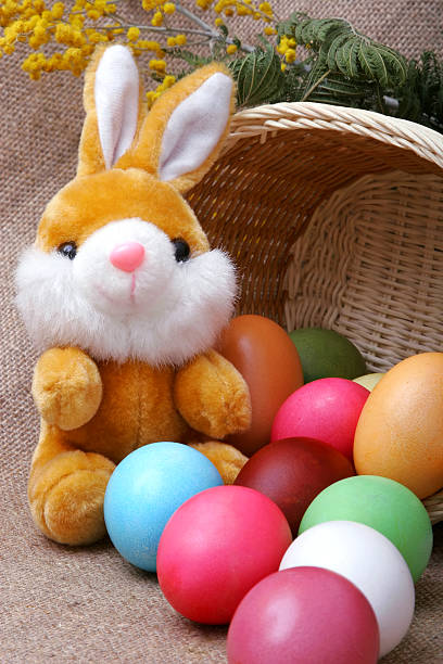 Merry Rabbit with Easter eggs stock photo