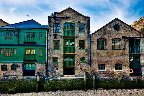 Converted Riverside Warehouse in London, HDR "converted warehouse apartments, Limehouse, Docklands, London, England, UKClick here to view more related images:" london docklands stock pictures, royalty-free photos & images