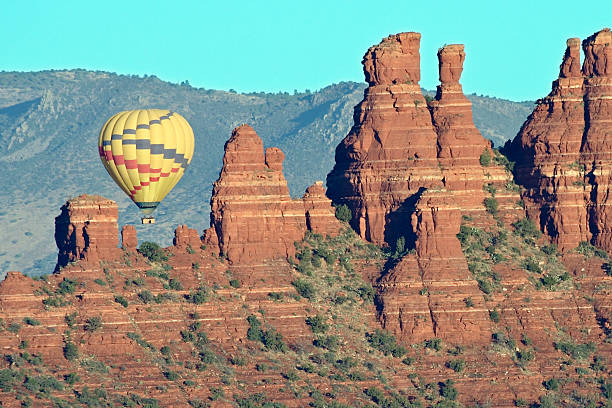 Balloon over red rocks stock photo