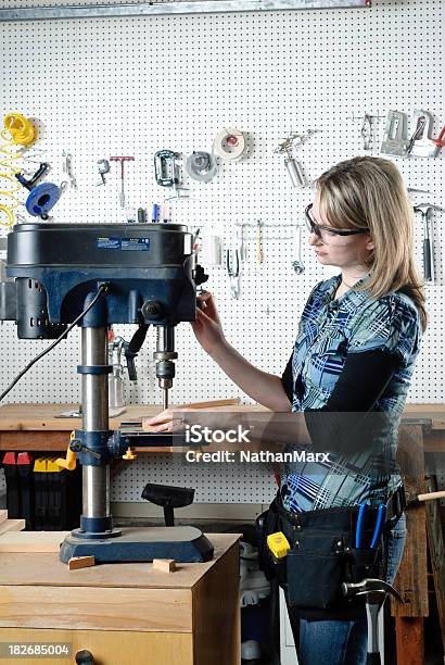 Woman Drilling At A Drill Press Stock Photo - Download Image Now - Adult, Adults Only, Blond Hair