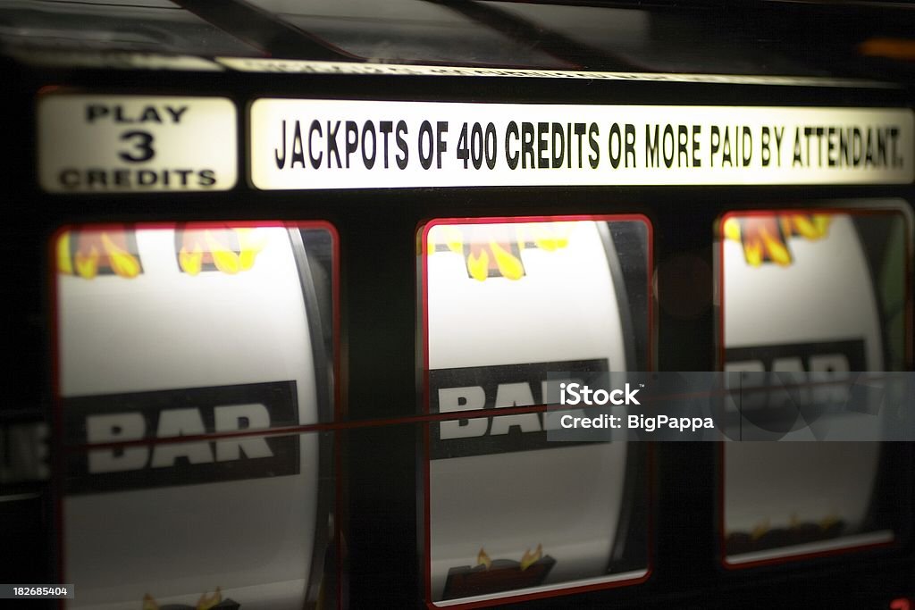 Winner! three bars on a slot machine. Addiction Stock Photo
