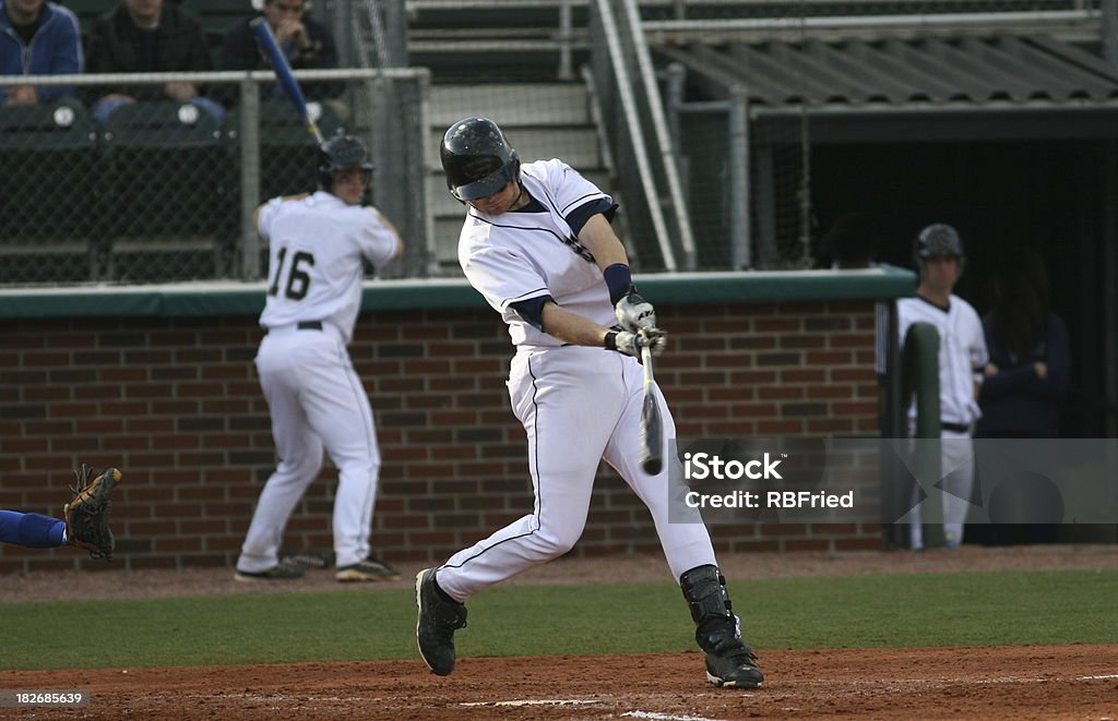 Hitter a man hitting a ball Baseball - Ball Stock Photo