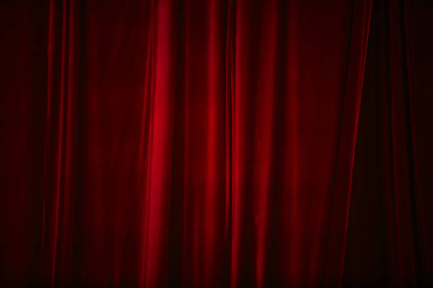 istock Red curtain in theatre 1826859999