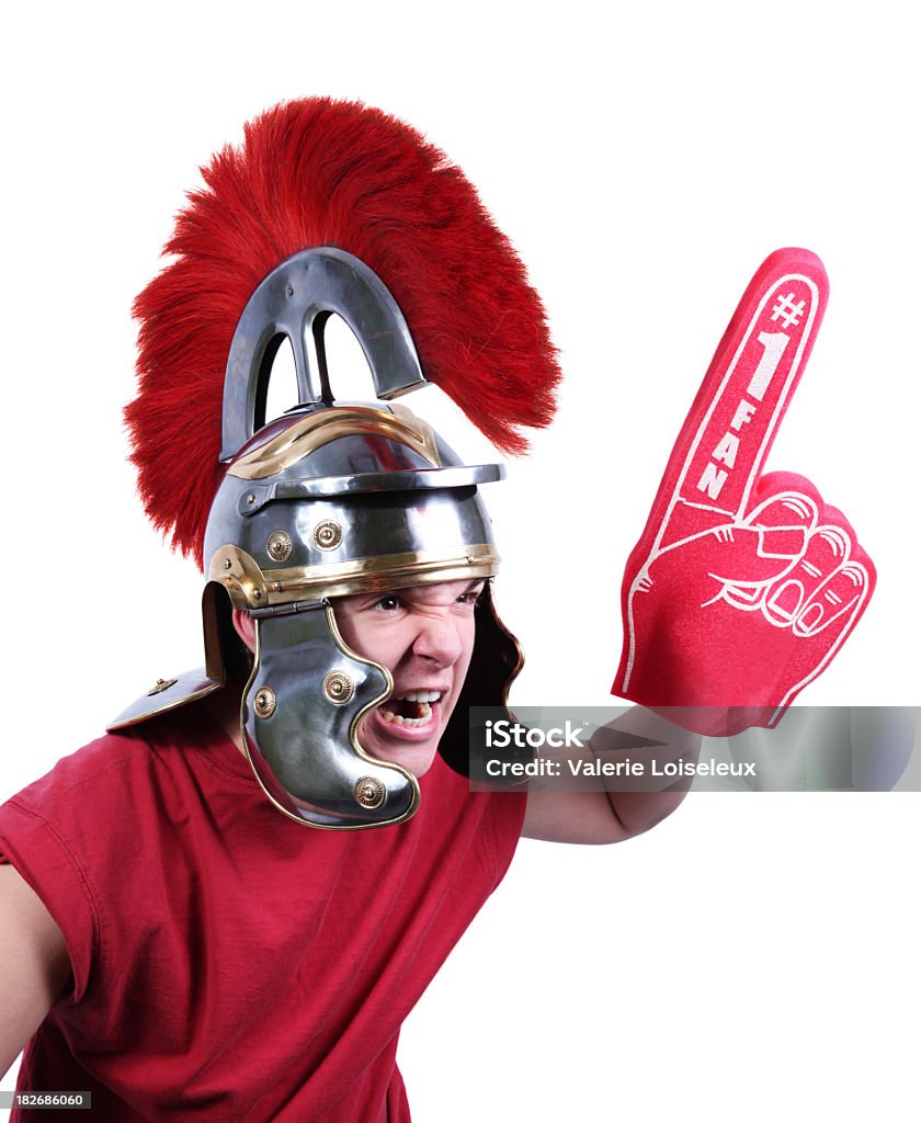 Adolescente con centurion casco e schiuma mano - Foto stock royalty-free di Gladiatore