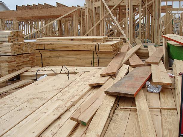 Jobsite lumber pile stock photo