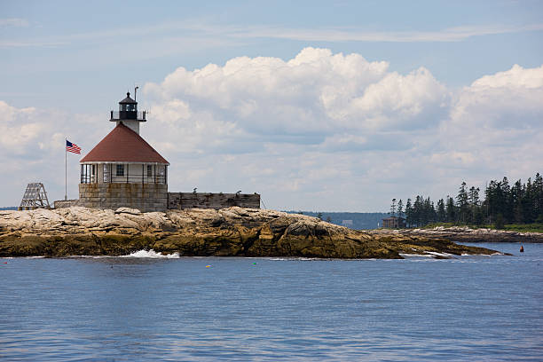 Cuckolds Lighthouse near Southport, Maine. stock photo