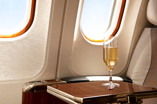Business Class Seat with served champagne stock photo