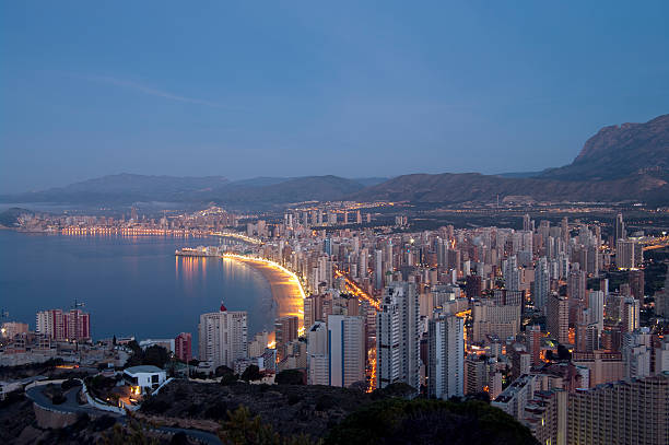 Dawn begins to break over the Valencia town of Benidorm. Slow shutterspeed used just before sunrise.
