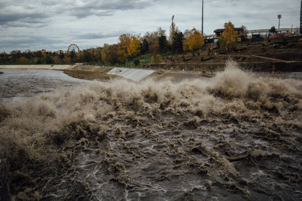 istock Spillway in Maykop dam, dirty water in river 1826882119