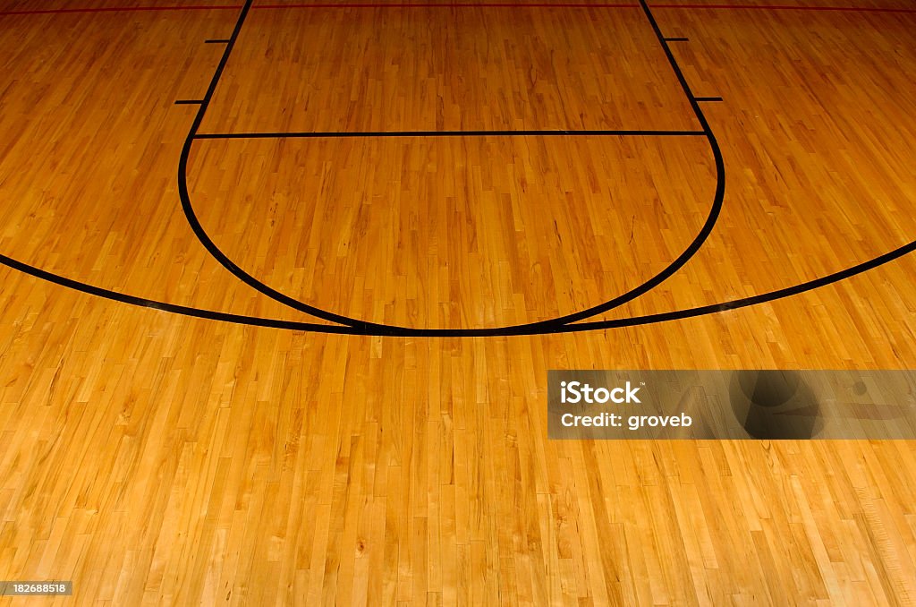 Simplistic aerial view of a basketball court Wooden basketball floor with the foul and three point line. Basketball - Sport Stock Photo