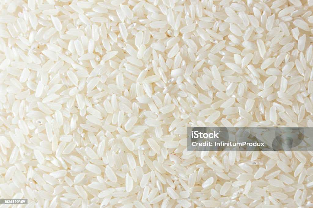Dry Rice Images Dry Uncooked White Rice Background Stock Photo - Download Image Now ...