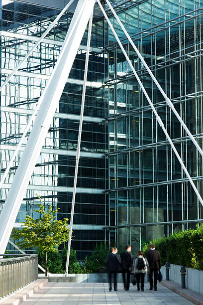 istock Group of Business People Walking Through Urban Passage 182690689