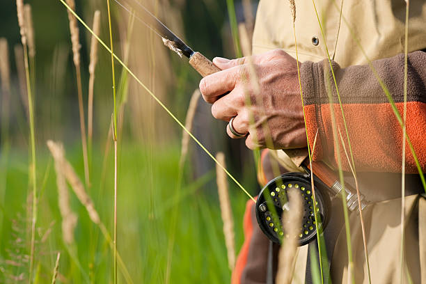 istock Fly-Fishing: Closeup of Hand Holding Rod 182690912