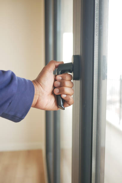 istock hand open gray plastic pvc window at home at early morning 1826909365