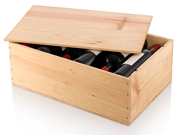 A partially opened wooden box full of red wine  Twelve bottle box of red wine. Isolated with clipping path. crate stock pictures, royalty-free photos & images