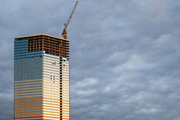 istock construction of high-rise building with cloudy sky 1826914726