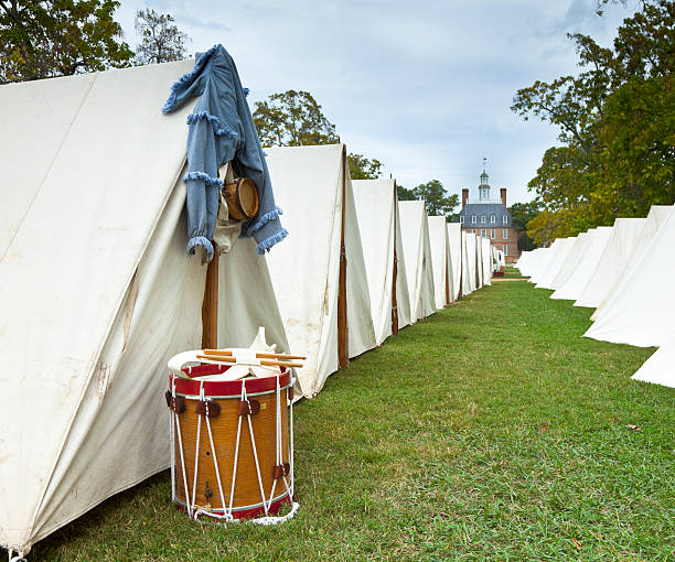 Revolutionary War Drum and Tents "Revolutionary War drum and tents by the Governor's Palace in Williamsburg, Virginia." governor's palace williamsburg stock pictures, royalty-free photos & images