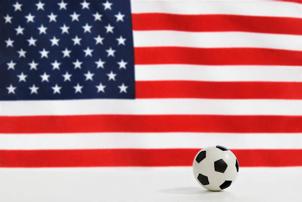 (football soccer ball y bandera de los estados unidos - american football football focus on foreground team sport fotografías e imágenes de stock
