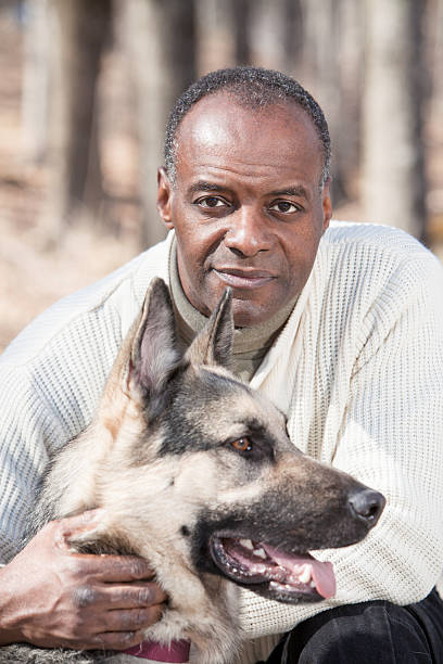 istock Mature Man with Dog Close Up 182692116