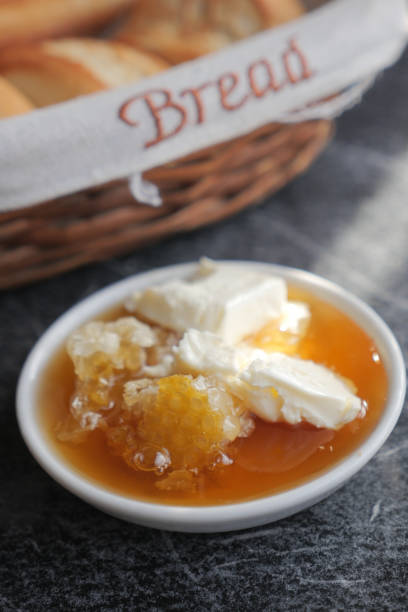 istock butter cream and honey in a bowl on table . 1826922705