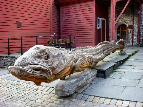Wooden fish sculpture. Close-up. Bergen. Norway.
