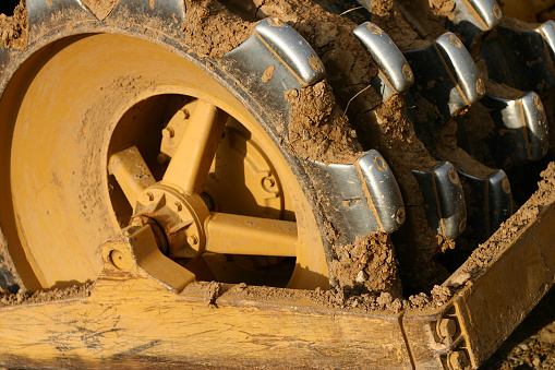 closeup on a road construction vehicle wheel