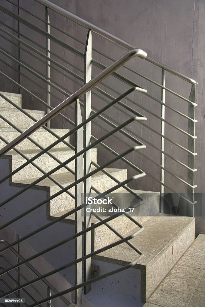 Set of concrete stairs with metal bannister Modern staircase. Abstract Stock Photo