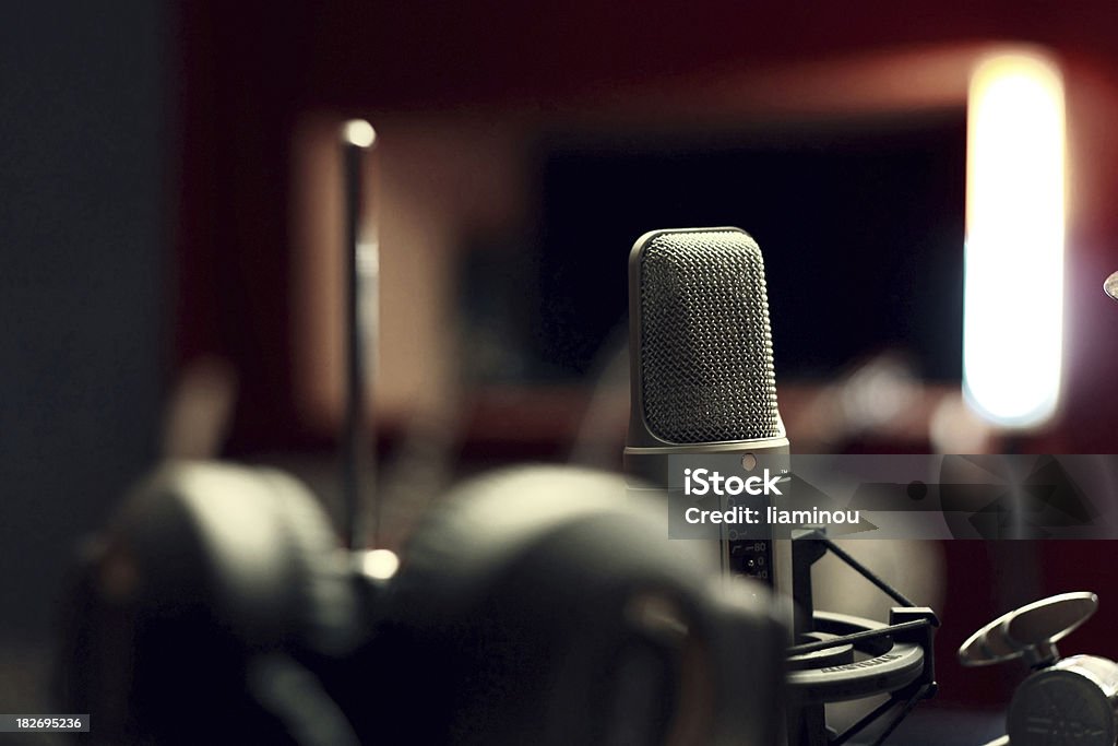 studio microphone studio microphone with headphones in foregroundmore studio: Microphone Stock Photo