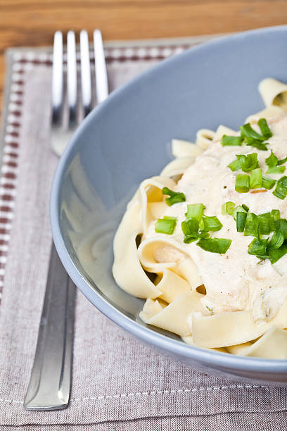 istock Tagliatelle pasta with sauce and spring onion 182695323