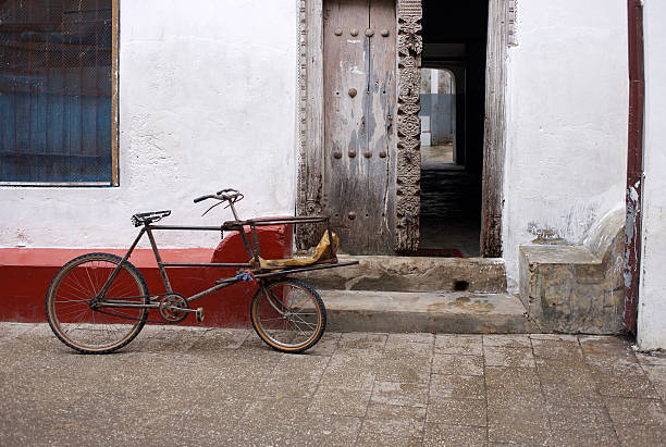 istock Bicycle parked ourtside doorway. 182695357