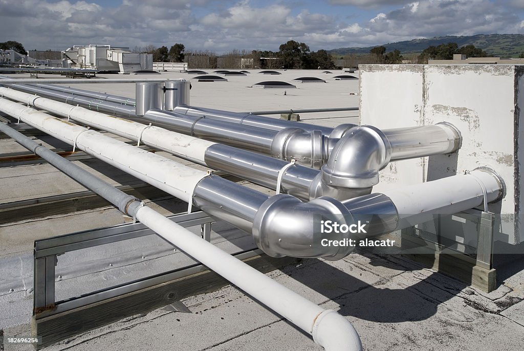 Retrofit HVAC "New insulated pipes added to an older, existing HVAC system.Click on any of the thumbnails below to see more images in my HVAC lightbox." Air Duct Stock Photo