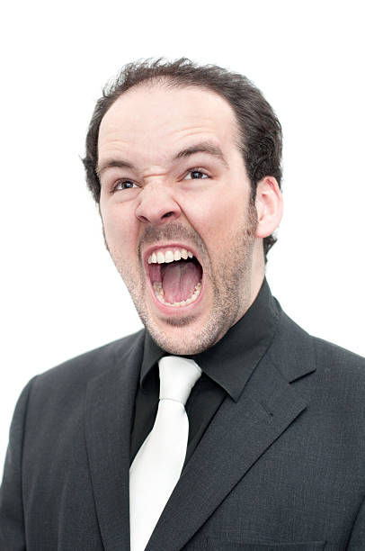 istock Man wearing suit, isolated on white, making a face, screaming 182696350