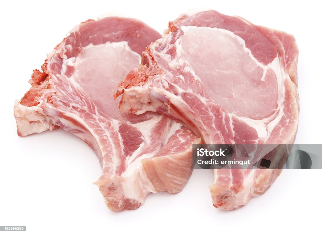 Dos chuletas de cerdo Aislado en blanco - Foto de stock de Chuleta libre de derechos