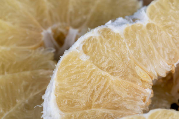 istock peeled pomelo on the table, close up 1826967436