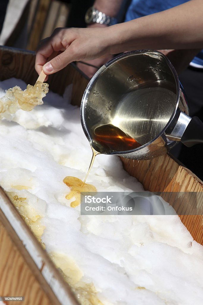 Maple Sugar Taffy on Snow at Sugar Shack Maple sugar on snow Maple Tree Stock Photo