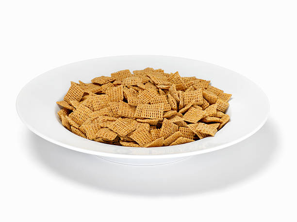 crispy conjunto de grãos de cereais de pequeno-almoço - shreddies imagens e fotografias de stock