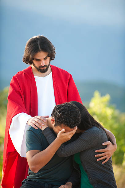 istock Jesus helping a sad couple 182698088