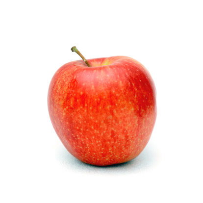 Closeup of a red-Gala apple isolated on a white background.