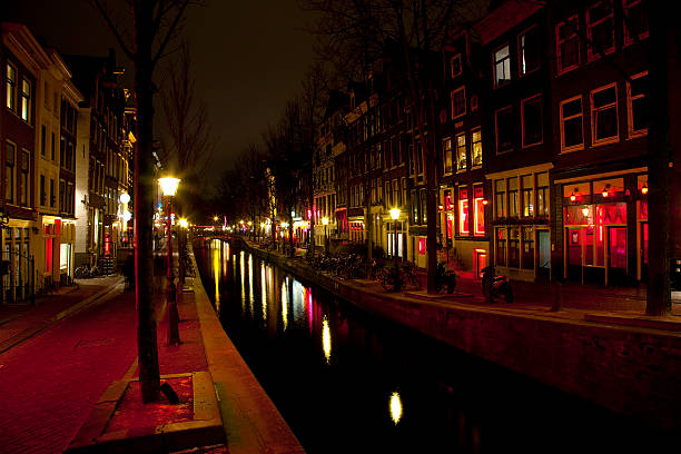 istock City of Amsterdam Red Light District at Night 182698240