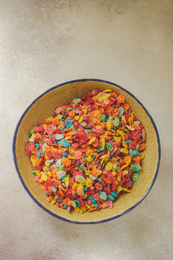 sweet multicolored gluten free rice flour breakfast cereal in a plate selective focus