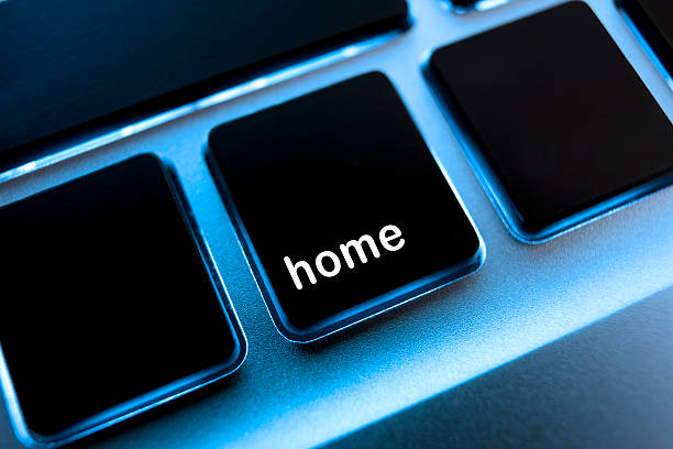 компьютер ноутбук клавиатура «home». - back lit computer keyboard keypad blue стоковые фото и изображения