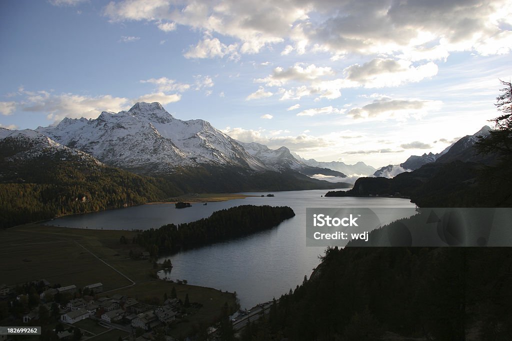 Silser See The place to take this photo is not easy to find. Taken at sunset in autumn. Due to the elevation of the valley the mountains are already covered with snow. Friedrich Nietzsche Stock Photo