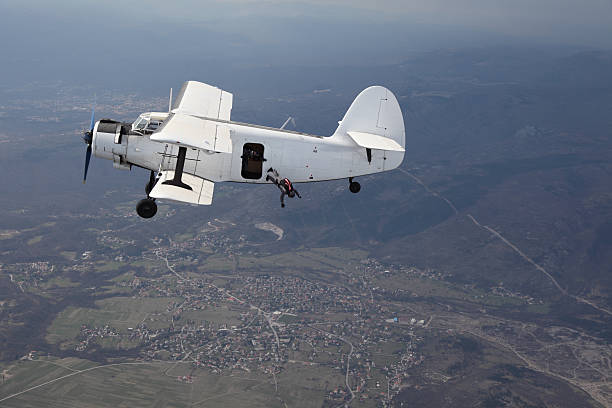 istock Parachutist jump from a plane 182699963